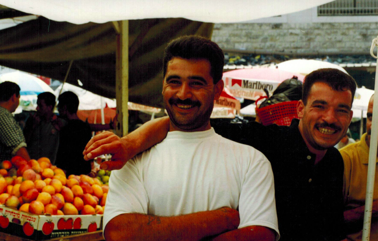 Men at the Market in Ramallah, Palestine, Circa 1998-99 (Photo by Chivvis Moore)